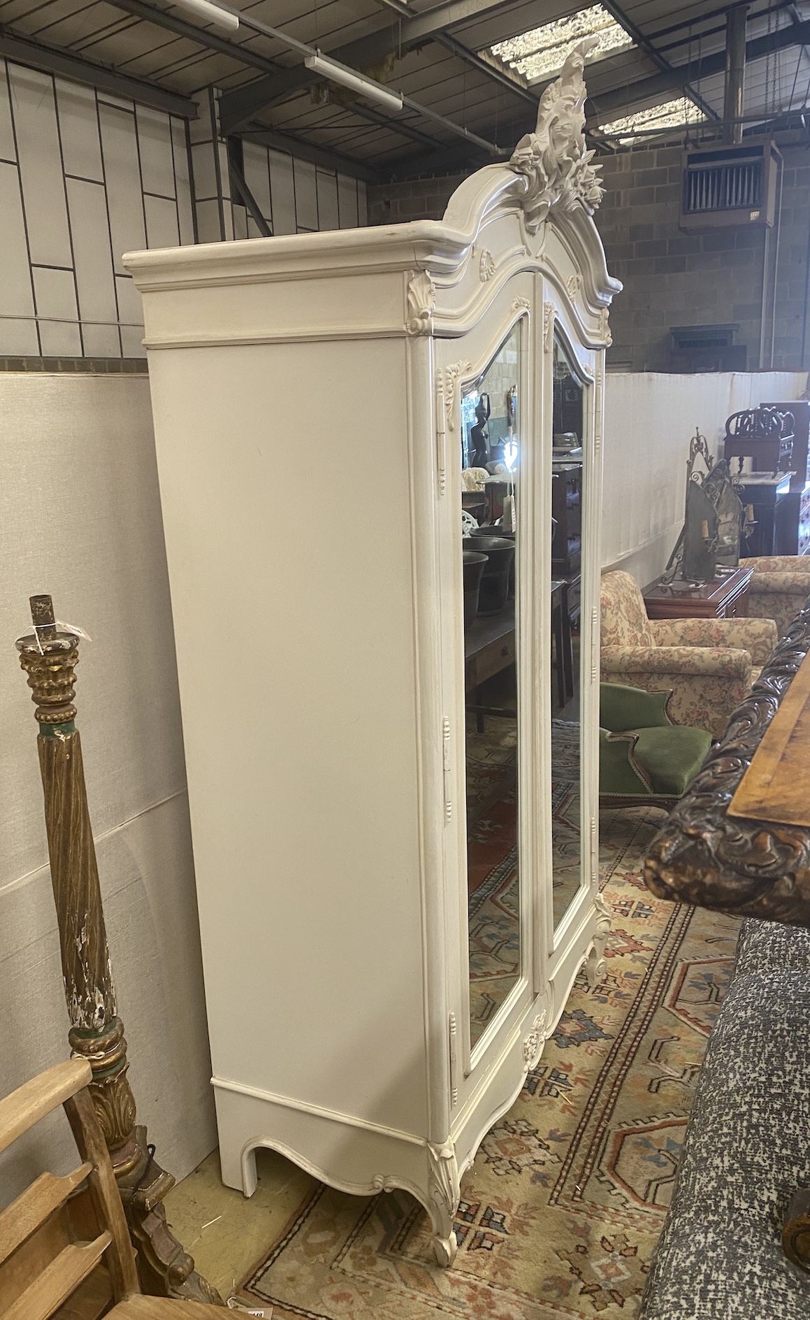 A Victorian style painted mirrored armoire, width 122cm, depth 63cm, height 238cm